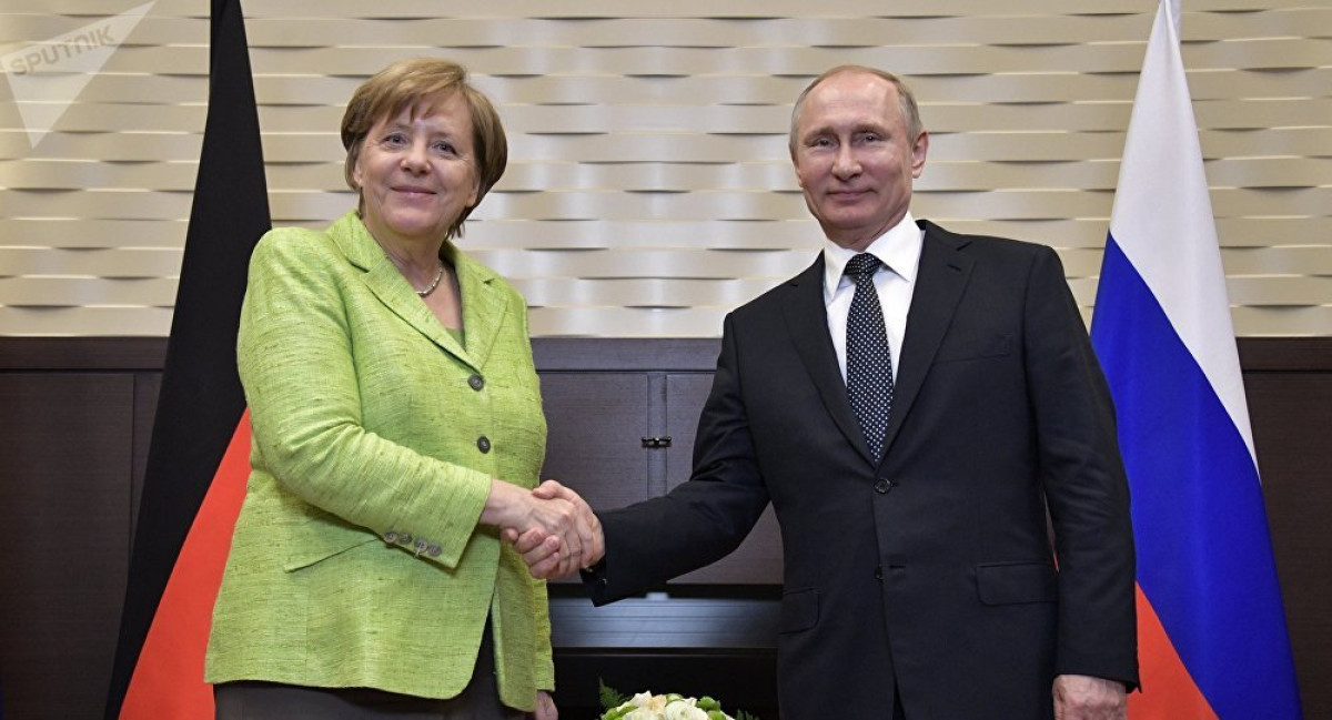 Coinciden Putin y Merkel en impulsar proceso político en Siria 