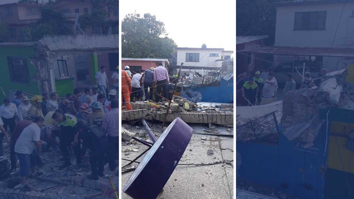 Cae loza y deja atrapados a tres personas