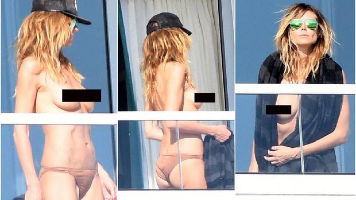 Heidi Klum se asolea en "topless"